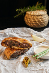 traditional arab food arais. grilled kebab in a pita