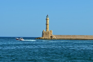 lighthouse in the old harbor of Chania, Crete, Greece