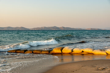 Sandbags as protection against erosion on the sandy beach of Kos