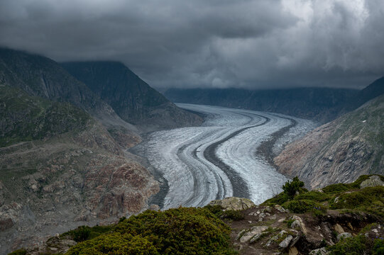 view over the shrinking ice of the mighty Aletsch Glacier in the swiss alps