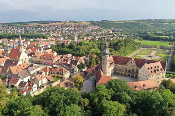 Aerial drone shot of the Cityscape of Weikersheim, Germany featuring its famous castle and church