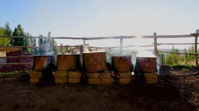 Boiled wheat used in bulgur production spreaded on the floor for drying in Tukey