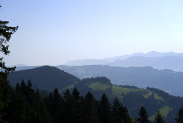 Naklejka premium Beautiful scenic mountain panorama seen from local mountain Pfänder on a sunny summer day. Photo taken August 15th, 2021, Bregenz, Austria.