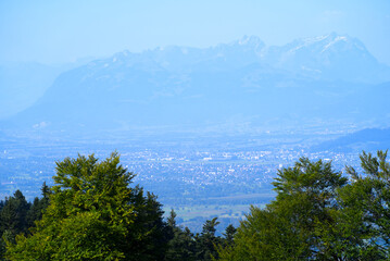 Obraz premium Beautiful scenic mountain panorama seen from local mountain Pfänder on a sunny summer day. Photo taken August 15th, 2021, Bregenz, Austria.