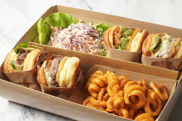 burger with fries and salad