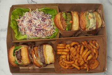 burger with fries and salad