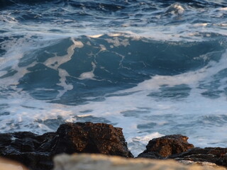 waves crashing on rocks