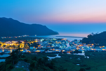 Idyllic landscape of landmark Tai O fishing village in Hong Kong at dusk