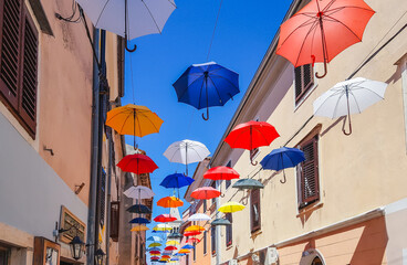 Fototapeta na wymiar Novigrad with umbrellas in the city