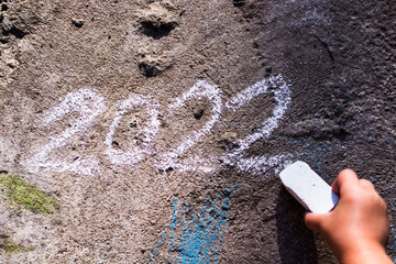 children's hand lettering 2022 in white chalk