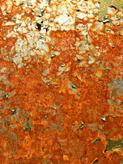 Bright rust showing through the peeling paint