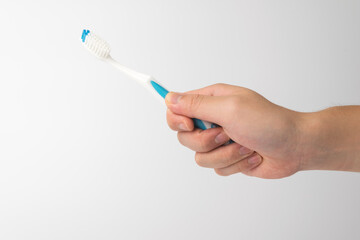 plastic toothbrush on a white background