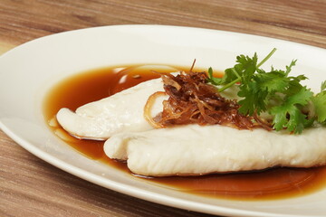 Steam fish with soya sauce