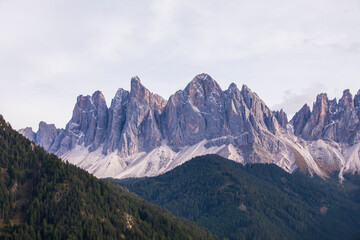 Sunset and rainbow in Val Di Funes, Dolomites, Alps, Italy
