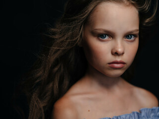 Fototapeta premium pretty girl posing fashion close-up dark background