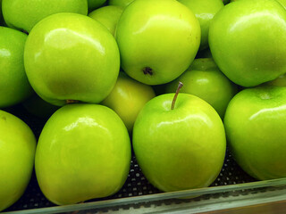 fresh green apples in the fridge