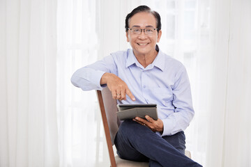 Elderly Man with Digital Tablet