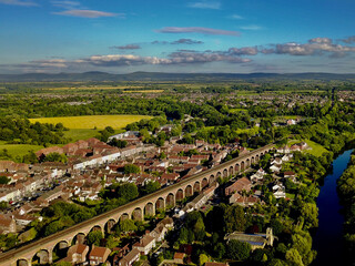 The skyline of historic market town of Yarm in North Yorkshire showing the railway viaduct