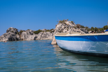 Fototapeta na wymiar wooden boat on the water's edge