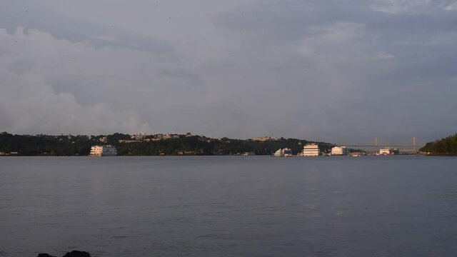 GOA, INDIA - Aug 22, 2021: Panaji, Goa India August 22nd 2021: Offshore Casinos and Tourist boats anchored in  Mandovi river in Panjim Goa