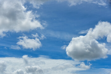 Beautiful white clouds on blue sky background.