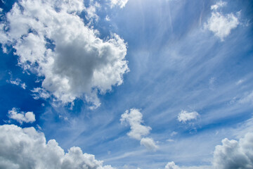 Beautiful white clouds on blue sky background.
