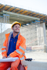 Worker standing on road in quarry