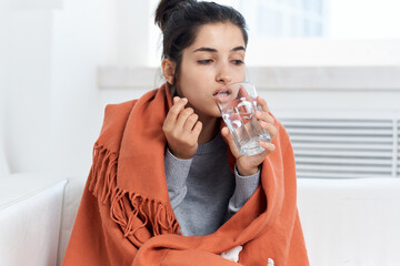 sick woman glass of water medicine health cold treatment