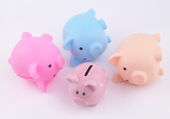 Bankruptcy of savings funds and quality of investments. One piggy banks standing and another piggy...