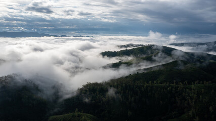 aerial view of clouds on beautiful mountains beautiful nature that covers the fertile tropical...