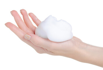 White foam mousse on hand on white background isolation