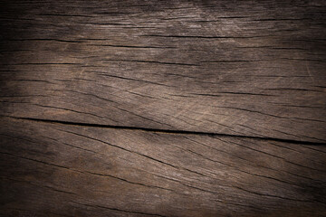 Naklejka premium Old wood texture background with natural cracks. Dark brown wood plank is used for background. 