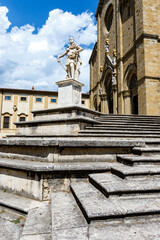 Statue of Ferdinando I de Medici, Grand Duke of Tuscany in fromt of the Duomo di Arezzo cathedral...