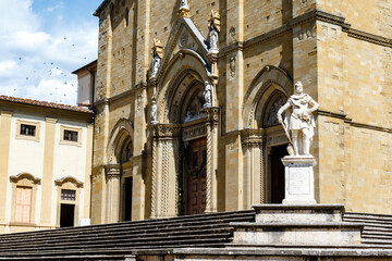 Statue of Ferdinando I de Medici, Grand Duke of Tuscany in fromt of the Duomo di Arezzo cathedral in the historic center of Arezzo, Tuscany, Italy, Europe