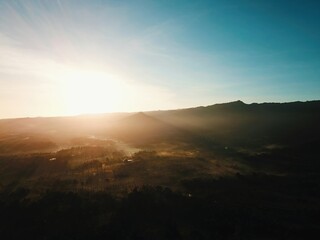 Fototapeta na wymiar Aerial Drone View of the Misty Morning in Bali