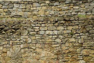 Old stone wall background, old castle wall, stone texture.