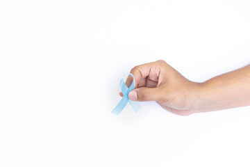 hand holding light blue ribbon, prostate cancer, white background