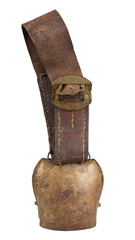 Old metal cowbell on weathered leather belt