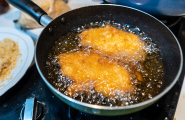 Close up view of katsu being fried