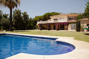 Luxury lap pool and villa