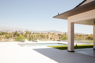 Swimming pool overlooking tree and mountains