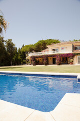 Luxury lap pool and villa
