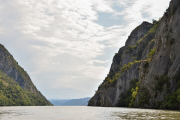 Fototapeta na wymiar Danube Gorges, Cazanele Mari, Romania. August 2021: Where the Danube meets the Carpathian Mountains