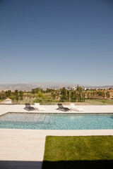 Swimming pool overlooking tree and mountains