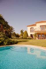 Luxury swimming pool and Spanish villa