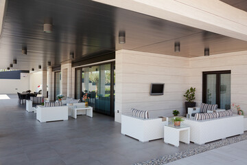 Sofa and television on luxury patio