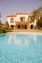 Swimming pool and Spanish villa