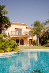 Luxury swimming pool and Spanish villa