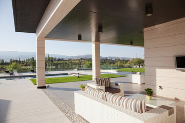 Sofa and television on luxury patio