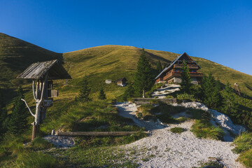 View of Golica Lodge. Still live with mountains. Karawanken, Begunje location, Slovenia, Europe. Traveling concept.